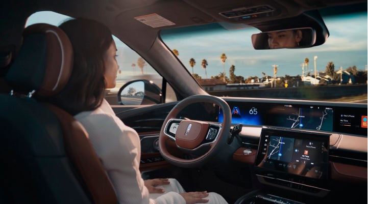 A person is shown driving hands-free on the highway with available Lincoln BlueCruise technology. | Mark McLarty Lincoln in North Little Rock AR