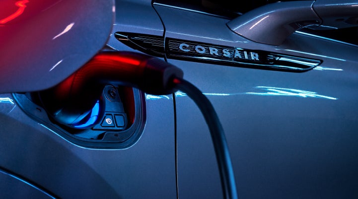 A charger plugged into the charging port of a 2024 Lincoln Corsair® Plug-in Hybrid model. | Mark McLarty Lincoln in North Little Rock AR