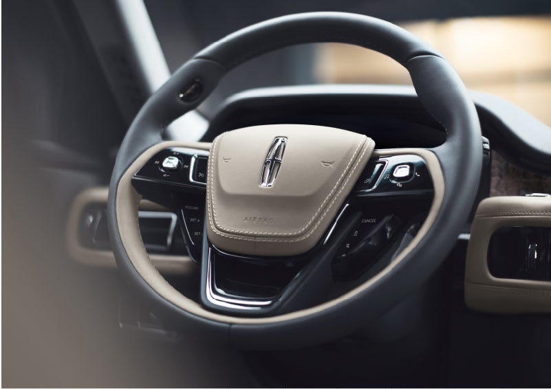 The intuitively placed controls of the steering wheel on a 2023 Lincoln Aviator® SUV | Mark McLarty Lincoln in North Little Rock AR
