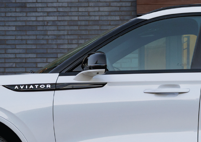 The driver’s door of a white 2025 Lincoln Aviator® SUV is showcased. | Mark McLarty Lincoln in North Little Rock AR