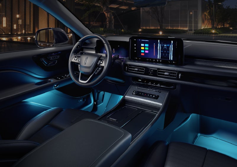 Deep blue ambient lighting glows from various places within a 2026 Lincoln Aviator® SUV. | Mark McLarty Lincoln in North Little Rock AR