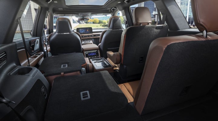 One side of the PowerFold® third-row seat and a second-row seat are folded forward in the 2026 Lincoln Aviator® SUV. | Mark McLarty Lincoln in North Little Rock AR