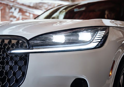 A close-up of a headlamp on the 2027 Lincoln Aviator® SUV is shown. | McLarty Lincoln in North Little Rock AR