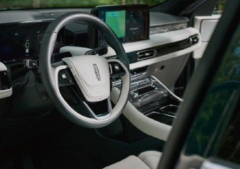 The leather-trimmed steering wheel of a 2027 Lincoln Aviator® Black Label™ SUV. | McLarty Lincoln in North Little Rock AR